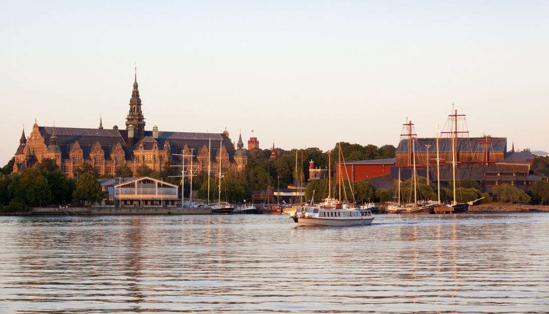 Ferry passing by the The Vasa Museum in Stockholm Sweden